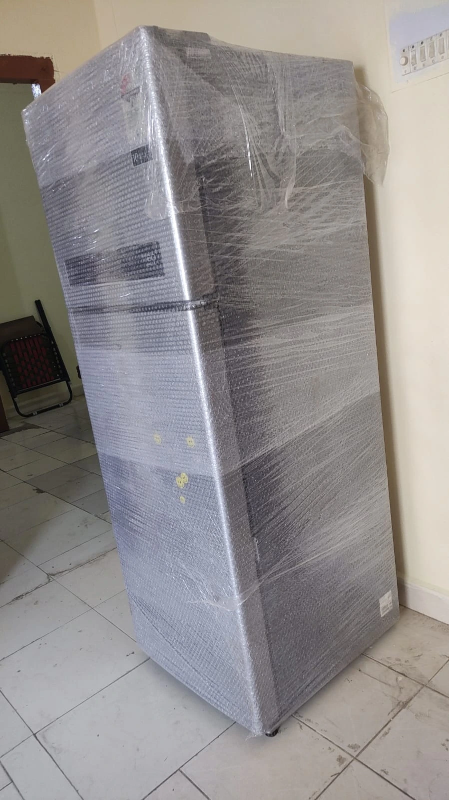 Fridge wrapped in bubble wrap