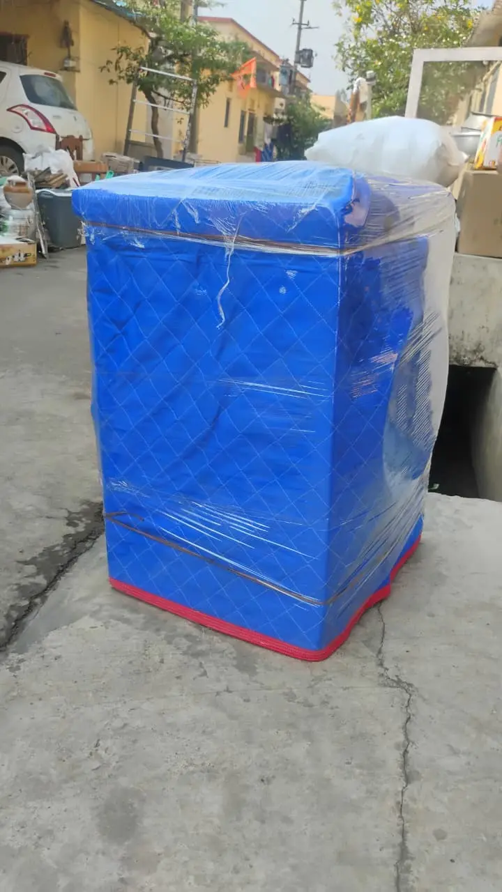 Washing machine packed in bubble wrap